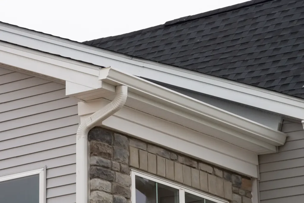 stone exterior and gutters